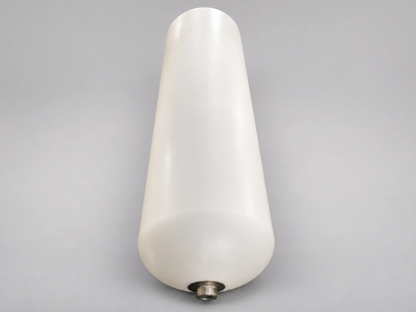 White molded industrial vessel with an outlet